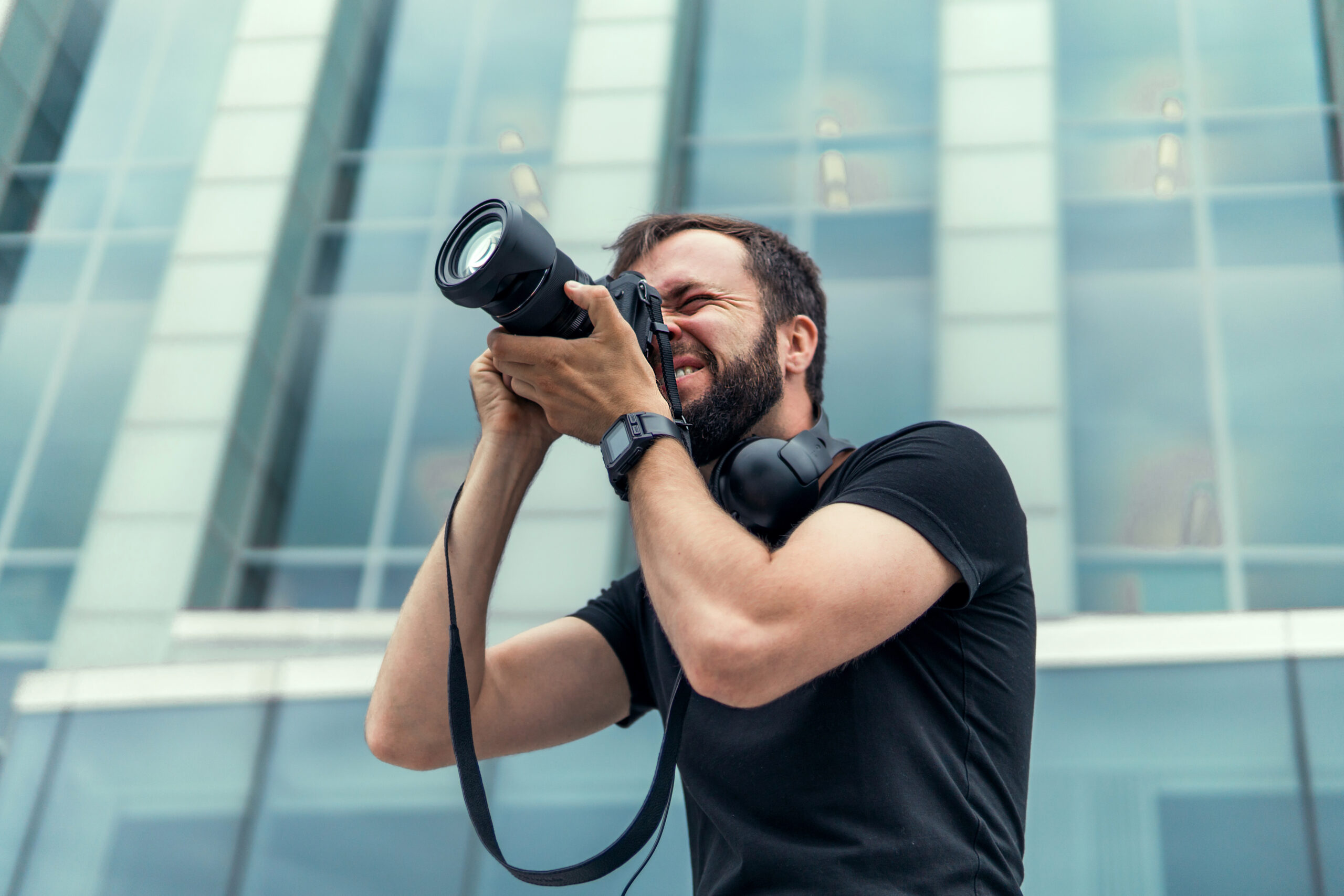 man taking photo with professional camera